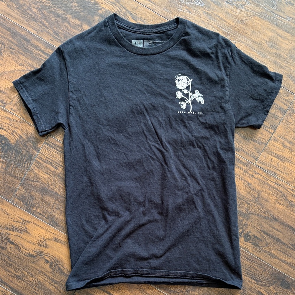 Lira Black Short Sleeve Tee with White Rose Chest Print